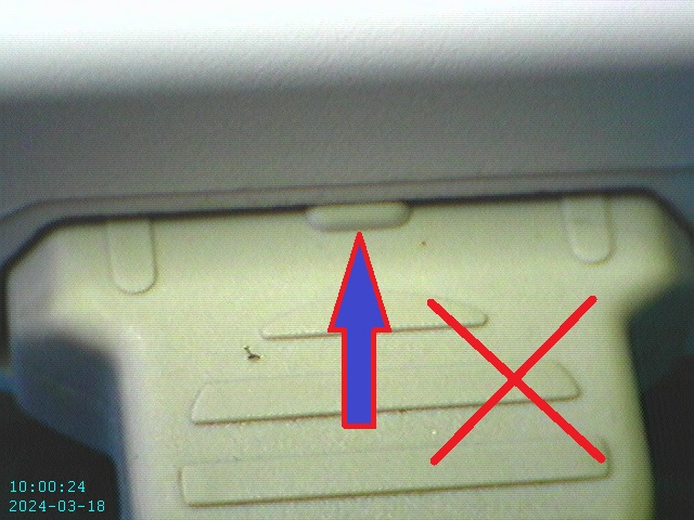 A close-up of a blue arrowDescription automatically generated